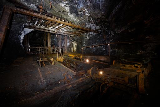 This transfer station moved carts back and forth between tracks when going up and down the shaft. It was powered by a hoist (left, not pictured).