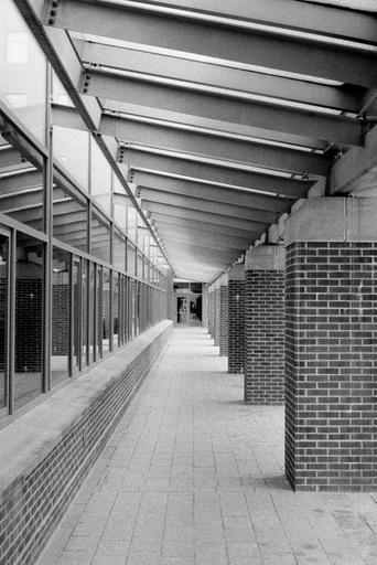 Looking down the telescoping walkway of Penn State's Benkovic building. Pentax ME Super + 50mm f/2 SMC.